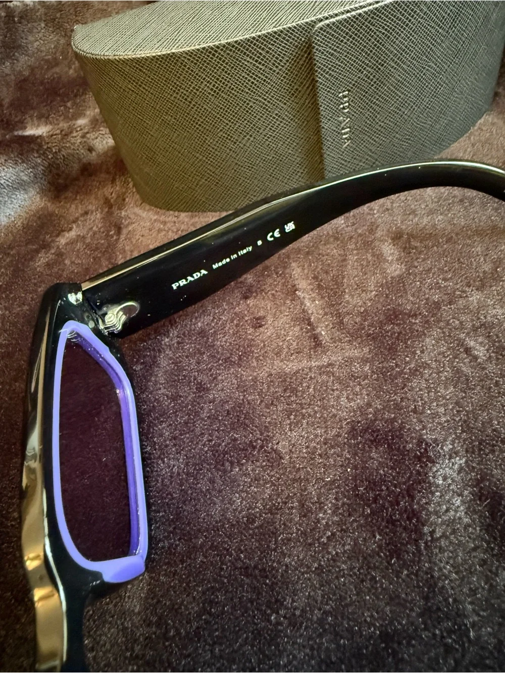 Prada Black sunglasses with violet lens